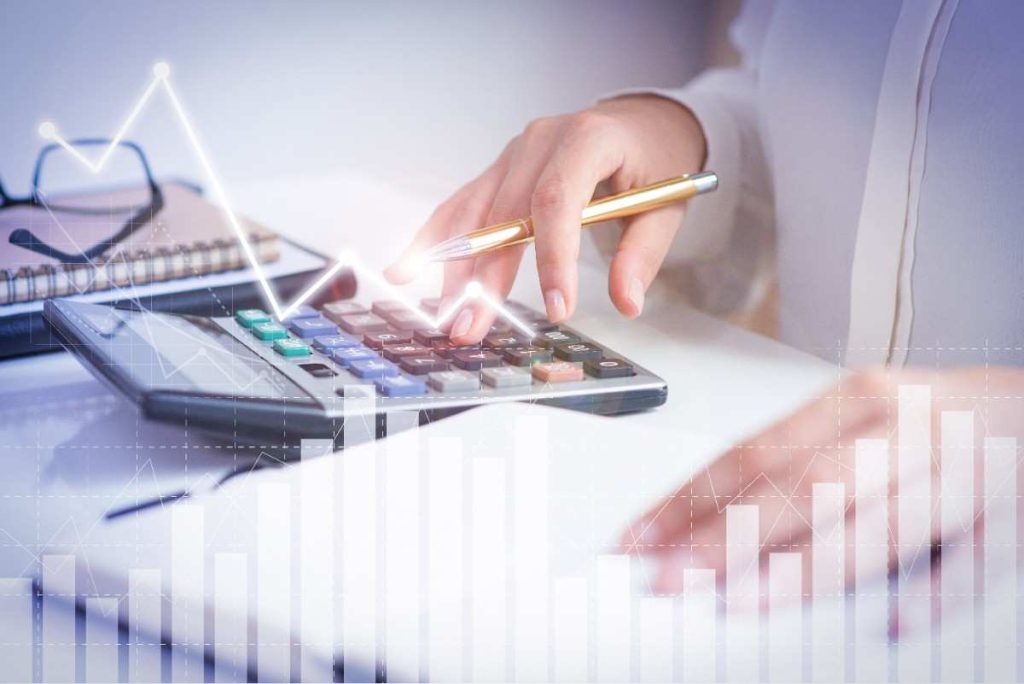 accountant-calculating-profit-with-financial-analysis-graphs1